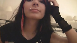 Emo girl with pierced nipples gets naked on webcam