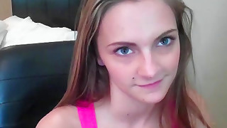 Smiling teenager fucks on cam for a first time